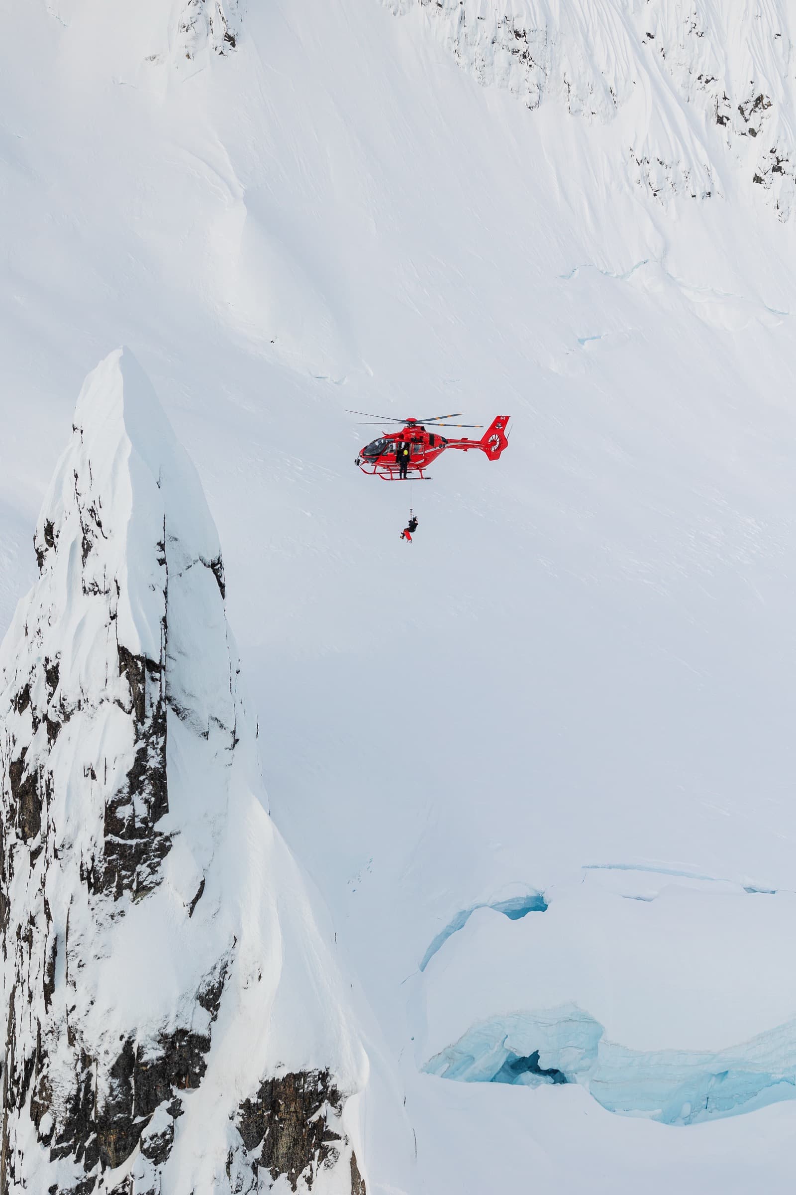Blackcomb Helicopters rescue operation on a glacier